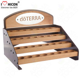 China Wood 4 Layer Cosmetic Display Stand Custom Cosmetic Retail Displays For Essential Oil supplier