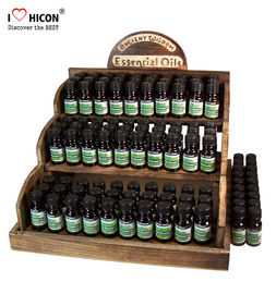China Counter Display Rack Fragrance Wooden Essential Oil Display Rack supplier