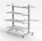 4 Caster Clothing Store Fixtures Double Sided Wood Shelves Slatwall Clothing Rack supplier